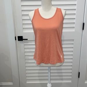 Ladies medium athletic top with fun open back! Burnt orange color and runs small